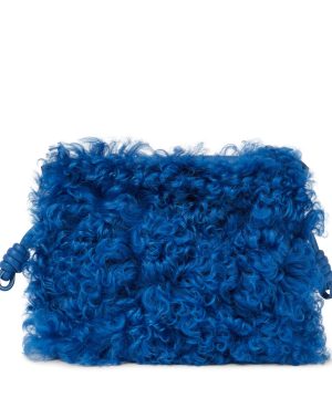 Flamenco shearling and leather clutch